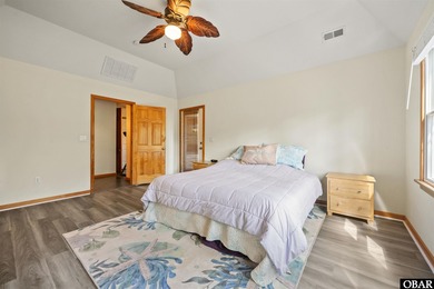 Don't miss out on this incredible canal-front home situated on on Duck Woods Country Club in North Carolina - for sale on GolfHomes.com, golf home, golf lot