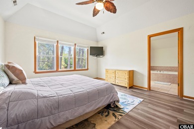 Don't miss out on this incredible canal-front home situated on on Duck Woods Country Club in North Carolina - for sale on GolfHomes.com, golf home, golf lot