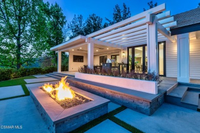 Completely re-imagined designer perfect contemporary with a on North Ranch Country Club in California - for sale on GolfHomes.com, golf home, golf lot