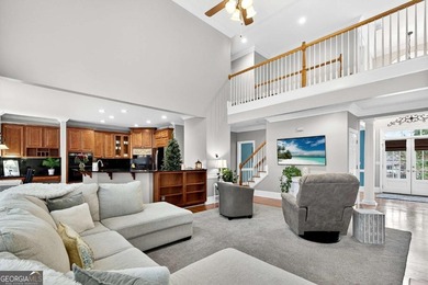 This stunning home in the prestigious gated with security guard on Whitewater Creek in Georgia - for sale on GolfHomes.com, golf home, golf lot