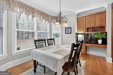 This stunning home in the prestigious gated with security guard on Whitewater Creek in Georgia - for sale on GolfHomes.com, golf home, golf lot