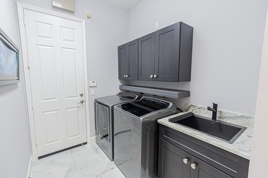 Impressive 3BR/3.5BA/2CG golf-front pool home in PGA Verano 4th on PGA Golf Club in PGA Village in Florida - for sale on GolfHomes.com, golf home, golf lot