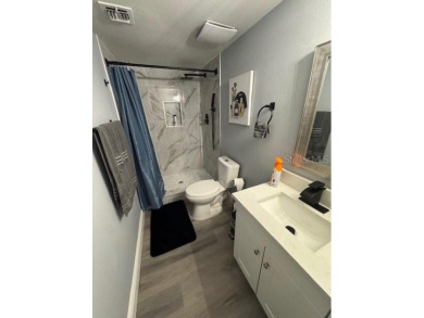 Newly renovated 2/2 end unit condo on 2nd floor. Property on Country Club At Silver Springs Shores in Florida - for sale on GolfHomes.com, golf home, golf lot