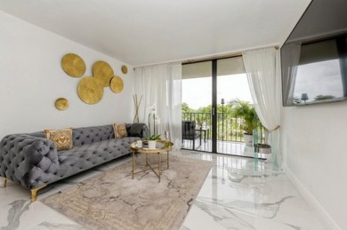 Renovated to perfection, this chic condominium in Lakeshore Club on The President Country Club in Florida - for sale on GolfHomes.com, golf home, golf lot