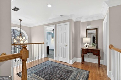 This stunning home in the prestigious gated with security guard on Whitewater Creek in Georgia - for sale on GolfHomes.com, golf home, golf lot