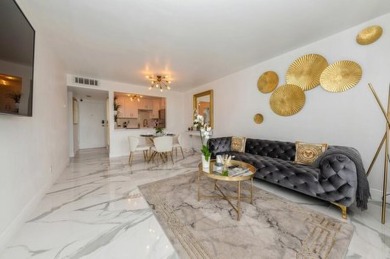 Renovated to perfection, this chic condominium in Lakeshore Club on The President Country Club in Florida - for sale on GolfHomes.com, golf home, golf lot