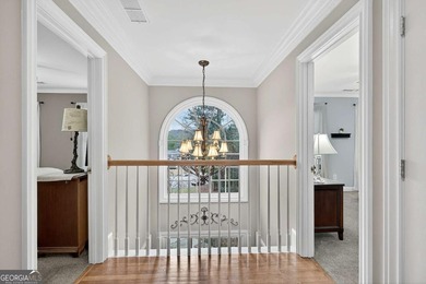 This stunning home in the prestigious gated with security guard on Whitewater Creek in Georgia - for sale on GolfHomes.com, golf home, golf lot