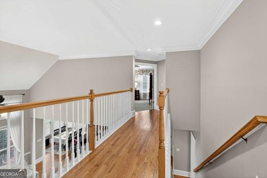 This stunning home in the prestigious gated with security guard on Whitewater Creek in Georgia - for sale on GolfHomes.com, golf home, golf lot