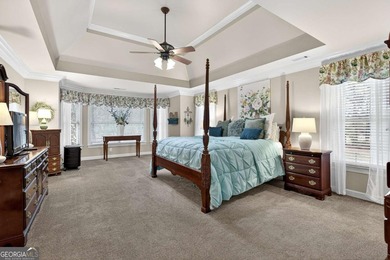 This stunning home in the prestigious gated with security guard on Whitewater Creek in Georgia - for sale on GolfHomes.com, golf home, golf lot