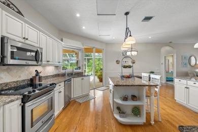 Nestled on over an acre of beautifully manicured and mature on Oak Ford Golf Club in Florida - for sale on GolfHomes.com, golf home, golf lot