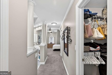 This stunning home in the prestigious gated with security guard on Whitewater Creek in Georgia - for sale on GolfHomes.com, golf home, golf lot