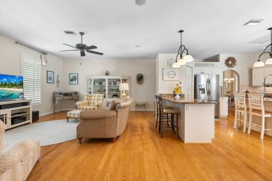 Nestled on over an acre of beautifully manicured and mature on Oak Ford Golf Club in Florida - for sale on GolfHomes.com, golf home, golf lot
