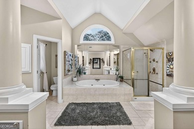 This stunning home in the prestigious gated with security guard on Whitewater Creek in Georgia - for sale on GolfHomes.com, golf home, golf lot