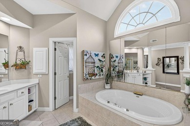 This stunning home in the prestigious gated with security guard on Whitewater Creek in Georgia - for sale on GolfHomes.com, golf home, golf lot