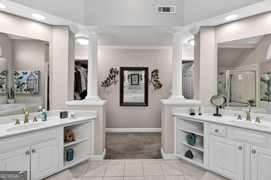 This stunning home in the prestigious gated with security guard on Whitewater Creek in Georgia - for sale on GolfHomes.com, golf home, golf lot