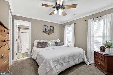 This stunning home in the prestigious gated with security guard on Whitewater Creek in Georgia - for sale on GolfHomes.com, golf home, golf lot