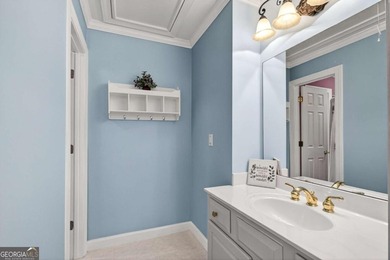 This stunning home in the prestigious gated with security guard on Whitewater Creek in Georgia - for sale on GolfHomes.com, golf home, golf lot