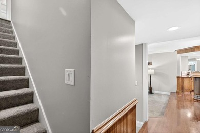 This stunning home in the prestigious gated with security guard on Whitewater Creek in Georgia - for sale on GolfHomes.com, golf home, golf lot