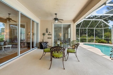 Nestled on over an acre of beautifully manicured and mature on Oak Ford Golf Club in Florida - for sale on GolfHomes.com, golf home, golf lot