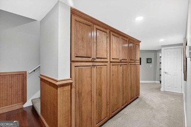 This stunning home in the prestigious gated with security guard on Whitewater Creek in Georgia - for sale on GolfHomes.com, golf home, golf lot