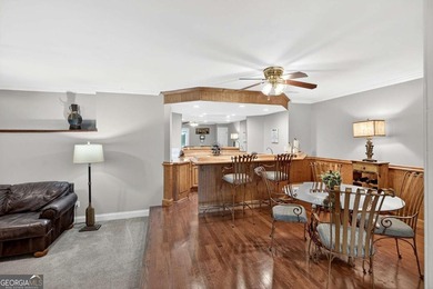 This stunning home in the prestigious gated with security guard on Whitewater Creek in Georgia - for sale on GolfHomes.com, golf home, golf lot