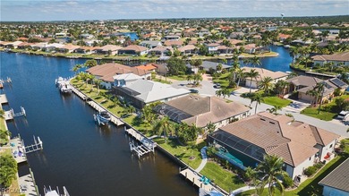 Experience the ultimate Florida waterfront lifestyle in this on Saint Andrews South Golf Club in Florida - for sale on GolfHomes.com, golf home, golf lot