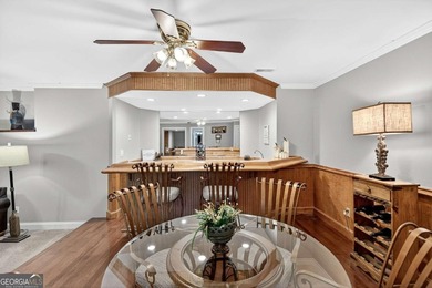 This stunning home in the prestigious gated with security guard on Whitewater Creek in Georgia - for sale on GolfHomes.com, golf home, golf lot