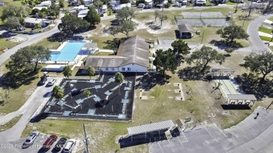 Welcome to paradise!  This lakefront home on Tooke Lake is on Glen Lakes Country Club in Florida - for sale on GolfHomes.com, golf home, golf lot