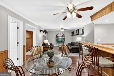 This stunning home in the prestigious gated with security guard on Whitewater Creek in Georgia - for sale on GolfHomes.com, golf home, golf lot