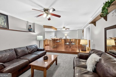 This stunning home in the prestigious gated with security guard on Whitewater Creek in Georgia - for sale on GolfHomes.com, golf home, golf lot