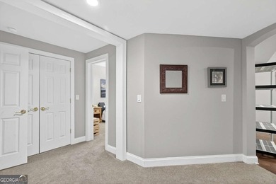 This stunning home in the prestigious gated with security guard on Whitewater Creek in Georgia - for sale on GolfHomes.com, golf home, golf lot