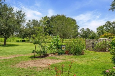 Nestled on over an acre of beautifully manicured and mature on Oak Ford Golf Club in Florida - for sale on GolfHomes.com, golf home, golf lot