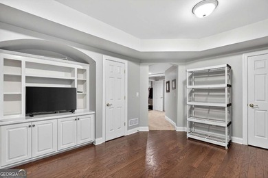 This stunning home in the prestigious gated with security guard on Whitewater Creek in Georgia - for sale on GolfHomes.com, golf home, golf lot