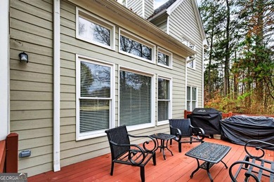 This stunning home in the prestigious gated with security guard on Whitewater Creek in Georgia - for sale on GolfHomes.com, golf home, golf lot