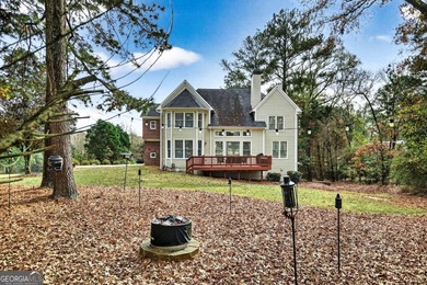 This stunning home in the prestigious gated with security guard on Whitewater Creek in Georgia - for sale on GolfHomes.com, golf home, golf lot