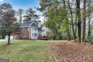 This stunning home in the prestigious gated with security guard on Whitewater Creek in Georgia - for sale on GolfHomes.com, golf home, golf lot