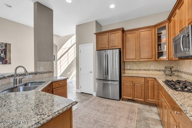 Beautiful & Move-In Ready Warwick II Model with Loft. Backs to on Greenbriar At Ocean Aire Golf and Country Club in New Jersey - for sale on GolfHomes.com, golf home, golf lot