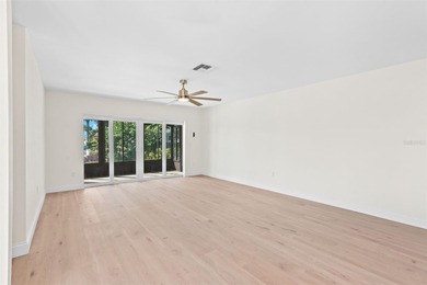 Welcome to 4448 Marine Parkway - Your Waterfront Dream Home on Gulf Harbors Golf Course in Florida - for sale on GolfHomes.com, golf home, golf lot