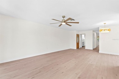 Welcome to 4448 Marine Parkway - Your Waterfront Dream Home on Gulf Harbors Golf Course in Florida - for sale on GolfHomes.com, golf home, golf lot