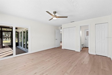 Welcome to 4448 Marine Parkway - Your Waterfront Dream Home on Gulf Harbors Golf Course in Florida - for sale on GolfHomes.com, golf home, golf lot