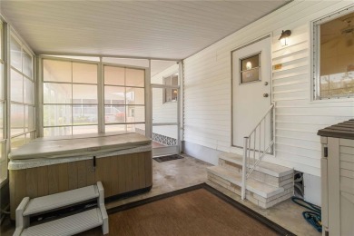 Welcome to this exquisitely remodeled residence in the highly on Twin Isles Country Club in Florida - for sale on GolfHomes.com, golf home, golf lot