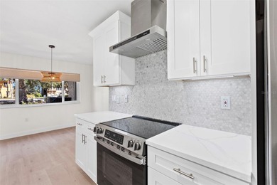 Welcome to 4448 Marine Parkway - Your Waterfront Dream Home on Gulf Harbors Golf Course in Florida - for sale on GolfHomes.com, golf home, golf lot