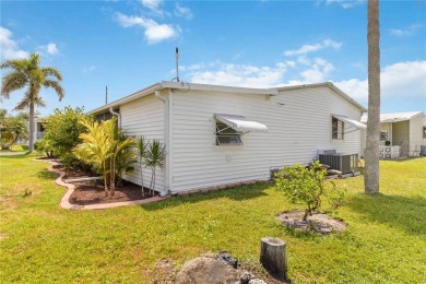 Welcome to this exquisitely remodeled residence in the highly on Twin Isles Country Club in Florida - for sale on GolfHomes.com, golf home, golf lot