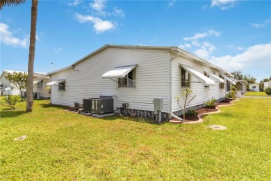 Welcome to this exquisitely remodeled residence in the highly on Twin Isles Country Club in Florida - for sale on GolfHomes.com, golf home, golf lot