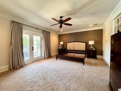 Located in the Grove Subdivision on a 1.72-acre lot, this on Country Club of Paducah in Kentucky - for sale on GolfHomes.com, golf home, golf lot