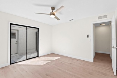 Welcome to 4448 Marine Parkway - Your Waterfront Dream Home on Gulf Harbors Golf Course in Florida - for sale on GolfHomes.com, golf home, golf lot