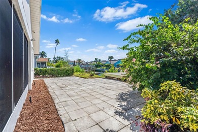 Welcome to 4448 Marine Parkway - Your Waterfront Dream Home on Gulf Harbors Golf Course in Florida - for sale on GolfHomes.com, golf home, golf lot