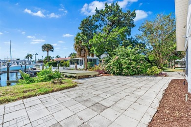 Welcome to 4448 Marine Parkway - Your Waterfront Dream Home on Gulf Harbors Golf Course in Florida - for sale on GolfHomes.com, golf home, golf lot