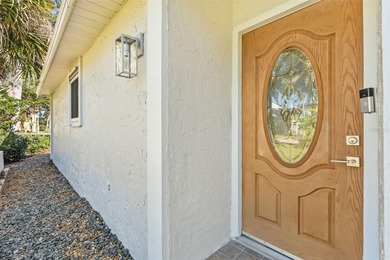 Welcome to 4448 Marine Parkway - Your Waterfront Dream Home on Gulf Harbors Golf Course in Florida - for sale on GolfHomes.com, golf home, golf lot