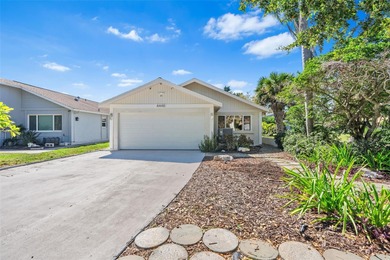 Welcome to 4448 Marine Parkway - Your Waterfront Dream Home on Gulf Harbors Golf Course in Florida - for sale on GolfHomes.com, golf home, golf lot